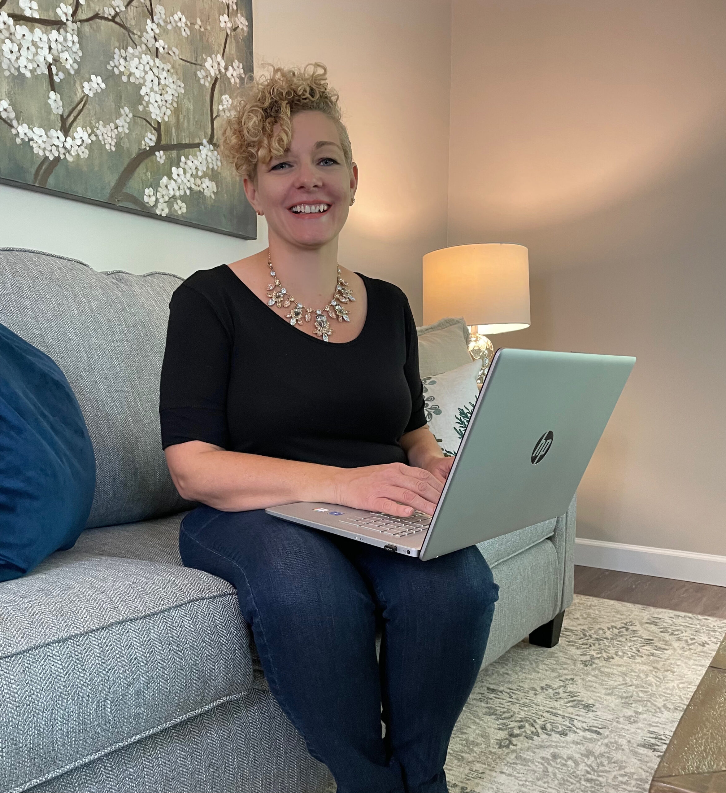 Elizabeth Jefferson working a real estate file on her laptop from her home office